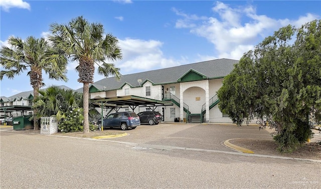 view of front of home with a carport