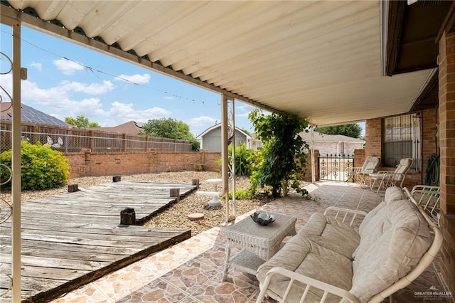 1923 Tyler St, Mission, TX 78572 - fenced backyard featuring a deck and a patio area