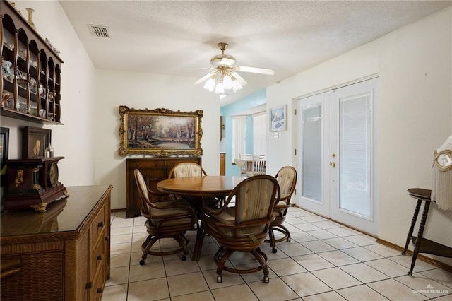 1923 Tyler St, Mission, TX 78572 - dining room with a ceiling fan, light tile patterned floors, baseboards, and french doors