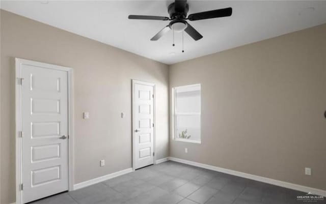 unfurnished bedroom featuring tile patterned floors and ceiling fan