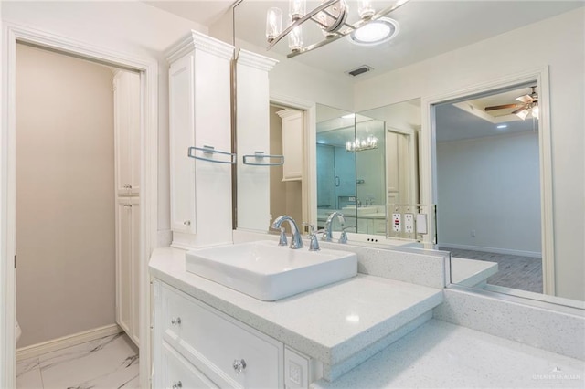 bathroom featuring vanity and ceiling fan