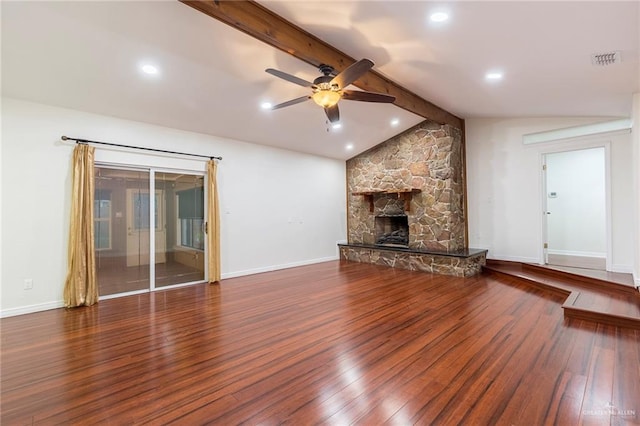 unfurnished living room featuring lofted ceiling with beams, a fireplace, dark wood-type flooring, and ceiling fan