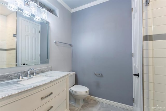 bathroom with parquet flooring, vanity, toilet, and ornamental molding