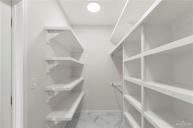 4313 Xenops Ave, Mcallen, TX 78504 - spacious closet featuring marble look tile flooring