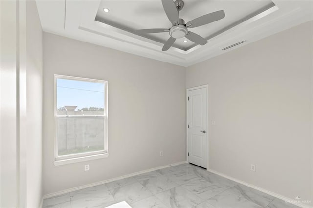 4313 Xenops Ave, Mcallen, TX 78504 - unfurnished room with a raised ceiling, light marble finish floors, baseboards, ceiling fan, and recessed lighting