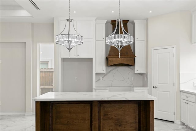 4313 Xenops Ave, Mcallen, TX 78504 - kitchen with a chandelier, decorative backsplash, white cabinetry, recessed lighting, and decorative light fixtures