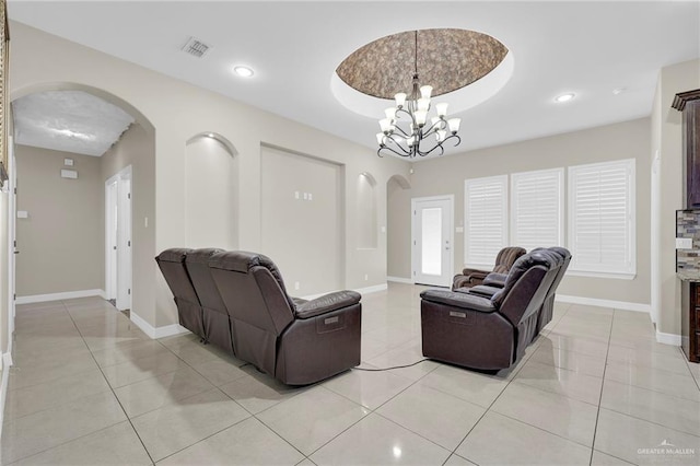3705 Joycee Dr, Mission, TX 78572 - living area featuring arched walkways, light tile patterned flooring, a chandelier, recessed lighting, and a tray ceiling