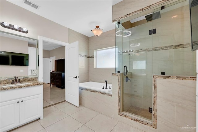 3705 Joycee Dr, Mission, TX 78572 - bathroom with a bath, vanity, a shower stall, and tile patterned flooring