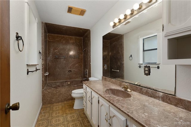 509 Lincoln Ln, La Feria, TX 78559 - full bathroom featuring vanity, toilet, and baseboards