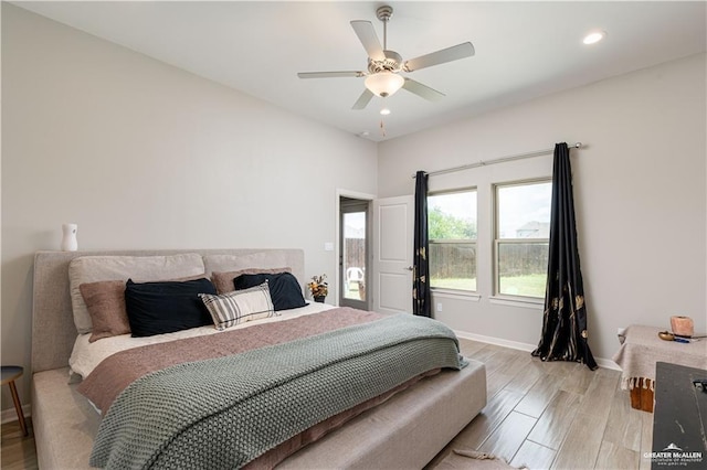 bedroom with a ceiling fan, recessed lighting, baseboards, and light wood finished floors