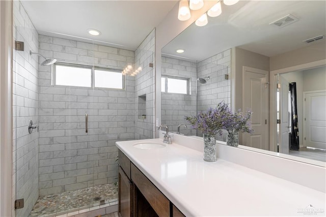 full bath featuring visible vents and a stall shower