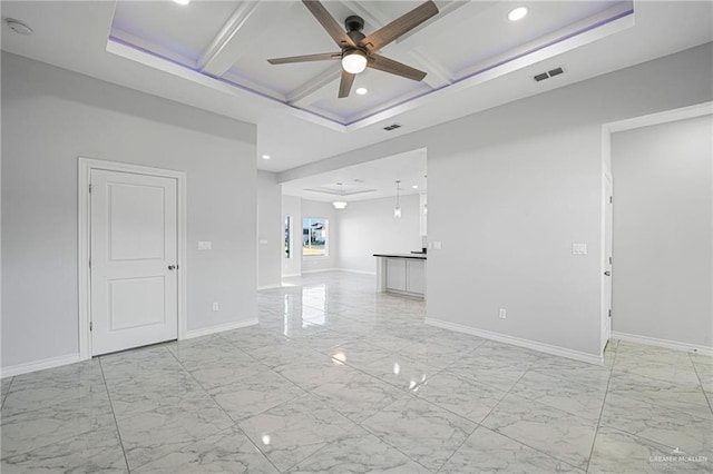 unfurnished living room with marble finish floor, coffered ceiling, and ceiling fan