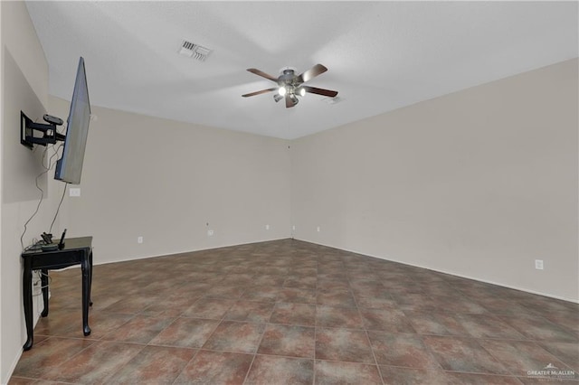 unfurnished living room featuring ceiling fan