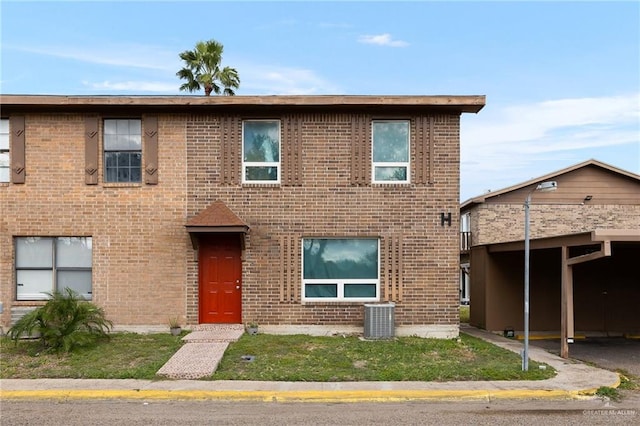 view of front of home featuring central air condition unit