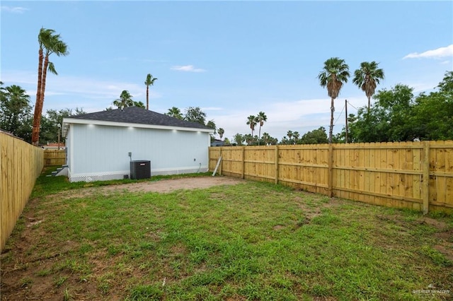 view of yard featuring central AC unit