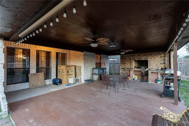 view of patio / terrace featuring area for grilling and ceiling fan