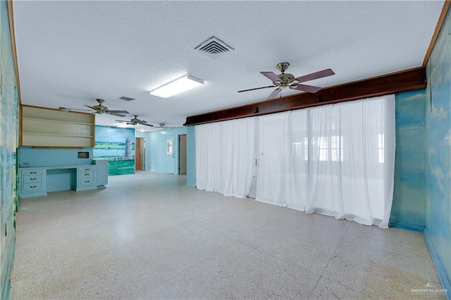 interior space with a textured ceiling