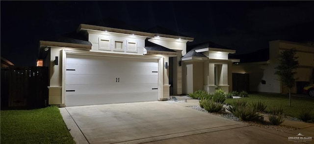 218 Stella Dr, San Juan, TX 78589 - view of front of property featuring driveway and a garage