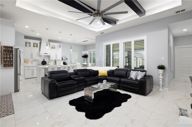 218 Stella Dr, San Juan, TX 78589 - living room with a ceiling fan, light marble finish flooring, recessed lighting, and baseboards