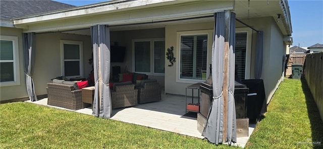218 Stella Dr, San Juan, TX 78589 - rear view of property featuring a patio area, outdoor lounge area, and stucco siding
