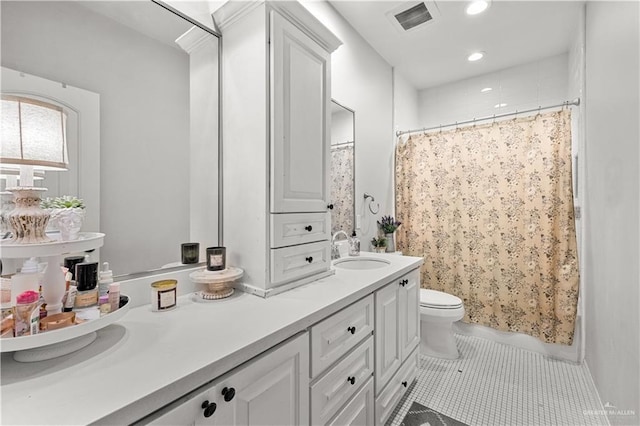 3313 Cornell Ave, Mcallen, TX 78504 - full bathroom featuring vanity, tile patterned flooring, toilet, a shower with shower curtain, and recessed lighting