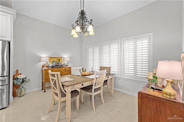 3313 Cornell Ave, Mcallen, TX 78504 - dining space with a chandelier, baseboards, and light tile patterned floors