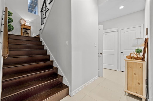 3313 Cornell Ave, Mcallen, TX 78504 - staircase with tile patterned floors, baseboards, and recessed lighting
