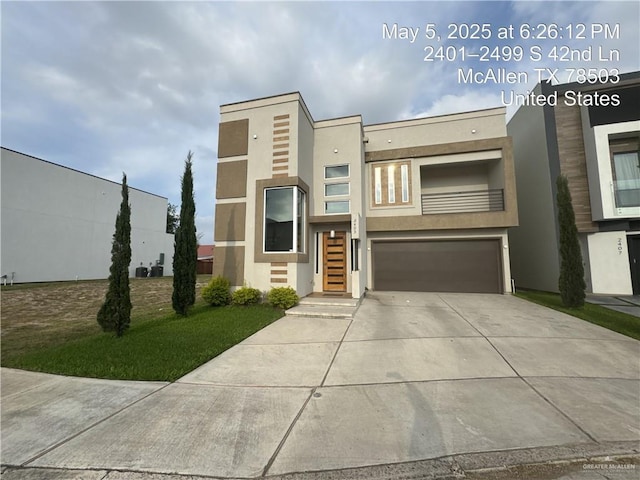 2403 S 42nd Ln, Mcallen, TX 78503 - contemporary home with a garage, stucco siding, and concrete driveway