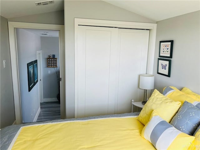 572 Sand Dollar Dr, Port Isabel, TX 78578 - bedroom with vaulted ceiling and a closet