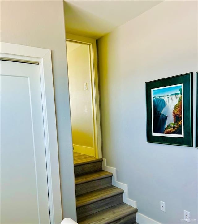 572 Sand Dollar Dr, Port Isabel, TX 78578 - stairway featuring baseboards and wood finished floors