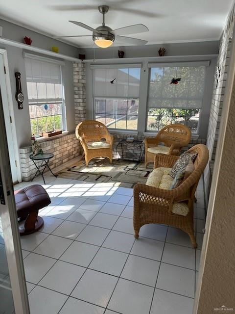 sunroom / solarium with ceiling fan