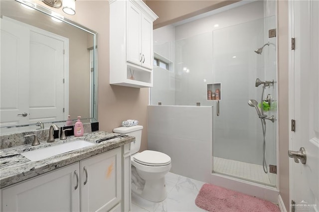 505 N 9th St, Mcallen, TX 78501 - full bathroom featuring marble look tiles, a shower stall, toilet, and vanity