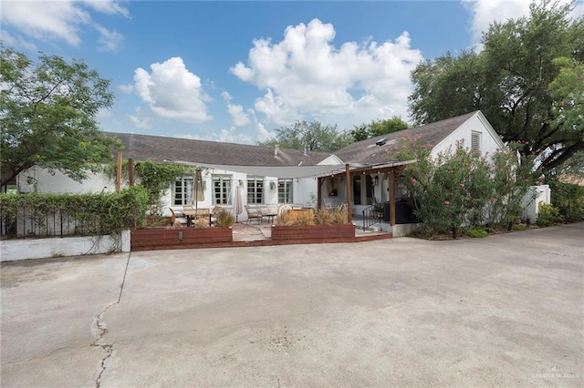1011 W Orange St, Mcallen, TX 78501 - rear view of house featuring a patio area