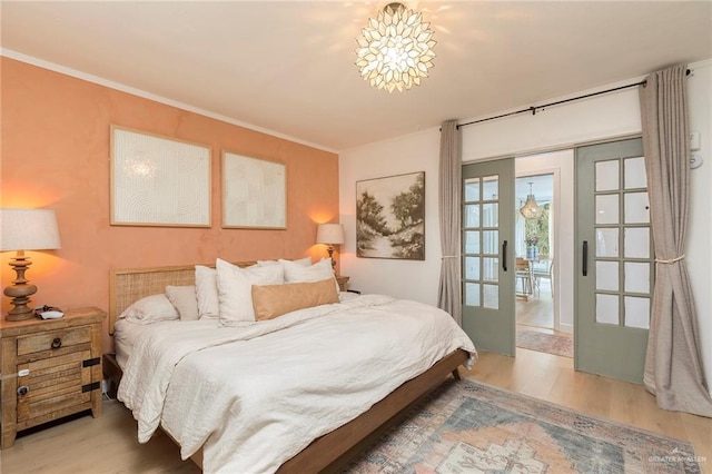 1011 W Orange St, Mcallen, TX 78501 - bedroom featuring wood finished floors and ornamental molding