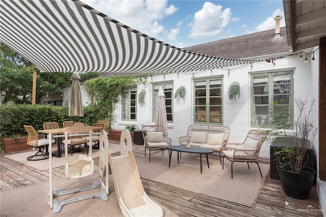 1011 W Orange St, Mcallen, TX 78501 - view of patio with an outdoor living space, outdoor dining space, and a wooden deck