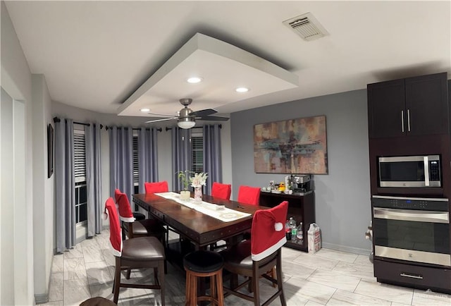 dining space featuring baseboards, visible vents, a ceiling fan, marble finish floor, and recessed lighting