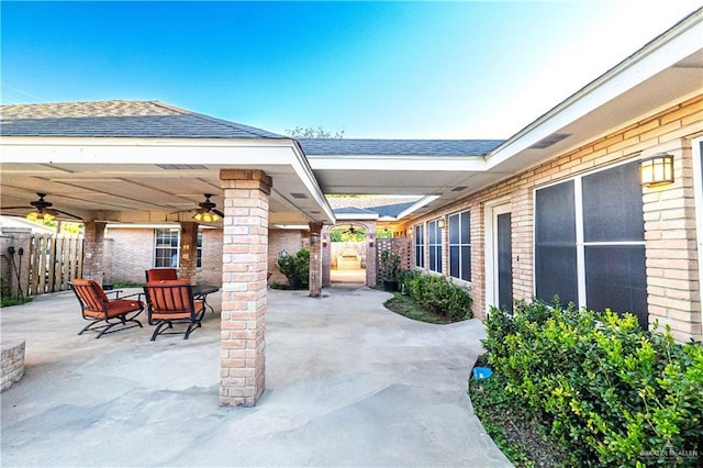 view of patio featuring ceiling fan