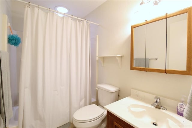 full bathroom featuring vanity, toilet, and shower / bathtub combination with curtain