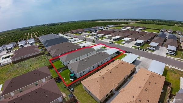 1009 W La Pointe Ave, Mission, TX 78573 - aerial perspective of suburban area with property boundaries highlighted