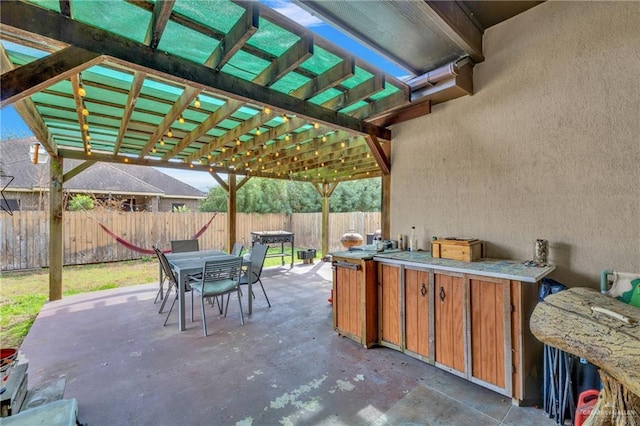 13908 N 40th St, Edinburg, TX 78541 - fenced backyard featuring a patio, a pergola, and outdoor dining area