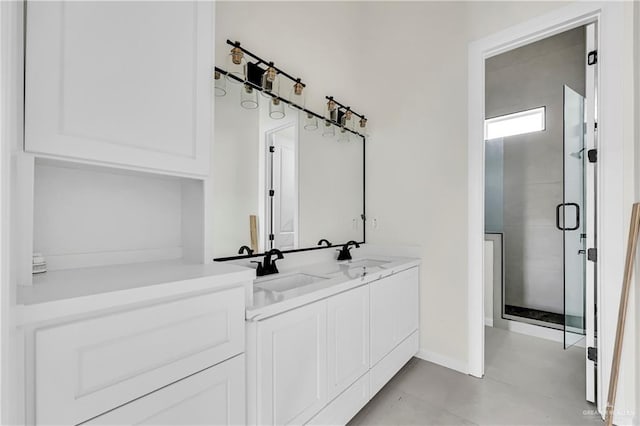 bathroom with vanity and walk in shower