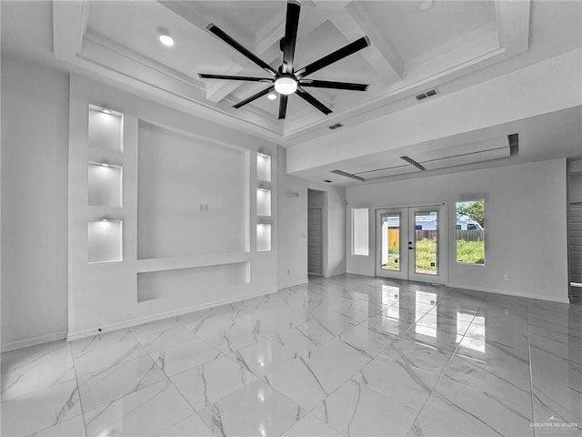 unfurnished room featuring french doors, ornamental molding, a tray ceiling, ceiling fan, and beamed ceiling