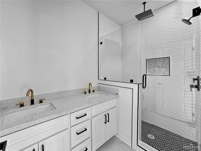 bathroom with vanity and walk in shower