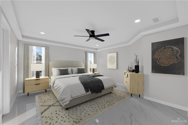 bedroom with ornamental molding and ceiling fan