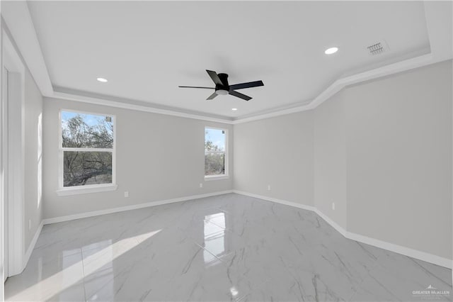 empty room with ornamental molding and ceiling fan