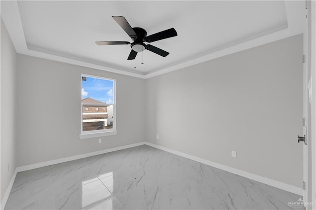 empty room with crown molding and ceiling fan