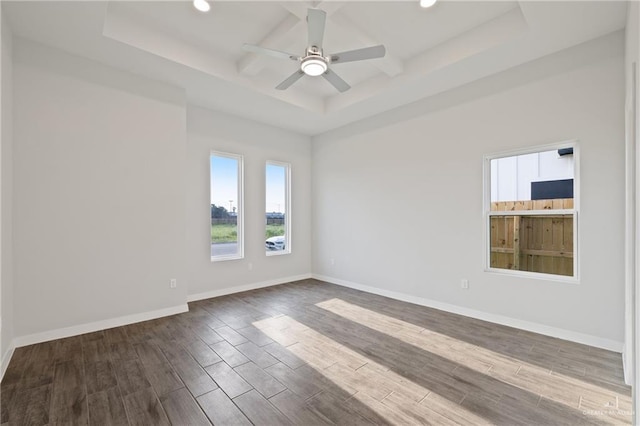 2214 N Gaytan St, Edinburg, TX 78542 - unfurnished room with healthy amount of natural light, a tray ceiling, dark wood finished floors, a ceiling fan, and recessed lighting