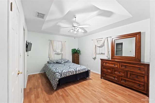 bedroom featuring hardwood / wood-style flooring and ceiling fan