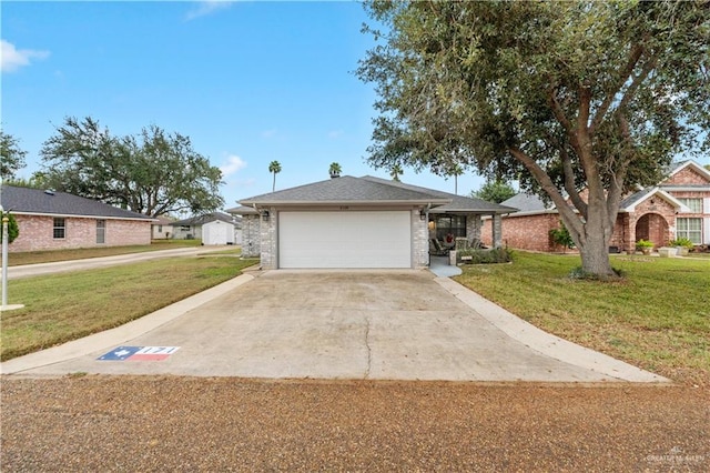 ranch-style house with a garage and a front lawn