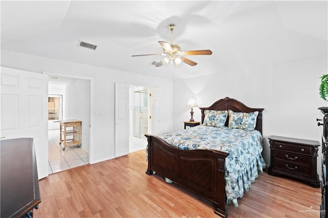 bedroom featuring ceiling fan and light hardwood / wood-style floors